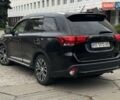 Черный Мицубиси Аутлендер, объемом двигателя 2.36 л и пробегом 167 тыс. км за 13500 $, фото 5 на Automoto.ua