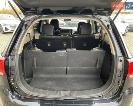 Черный Мицубиси Аутлендер, объемом двигателя 2.36 л и пробегом 143 тыс. км за 12900 $, фото 25 на Automoto.ua