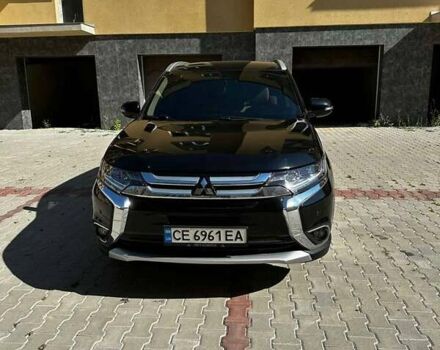 Чорний Міцубісі Аутлендер, об'ємом двигуна 2.36 л та пробігом 225 тис. км за 13699 $, фото 4 на Automoto.ua