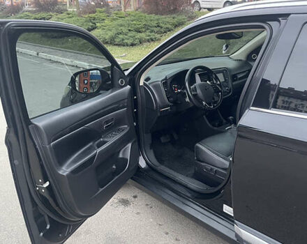 Черный Мицубиси Аутлендер, объемом двигателя 3 л и пробегом 260 тыс. км за 13799 $, фото 19 на Automoto.ua