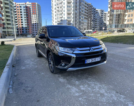 Черный Мицубиси Аутлендер, объемом двигателя 2.36 л и пробегом 150 тыс. км за 14900 $, фото 2 на Automoto.ua