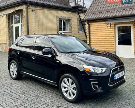 Чорний Міцубісі Аутлендер, об'ємом двигуна 2 л та пробігом 170 тис. км за 10999 $, фото 4 на Automoto.ua