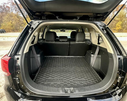 Черный Мицубиси Аутлендер, объемом двигателя 2.36 л и пробегом 119 тыс. км за 15600 $, фото 10 на Automoto.ua