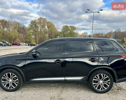 Черный Мицубиси Аутлендер, объемом двигателя 2.36 л и пробегом 119 тыс. км за 15600 $, фото 3 на Automoto.ua