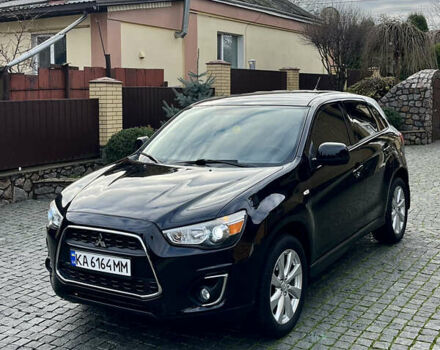 Чорний Міцубісі Аутлендер, об'ємом двигуна 2 л та пробігом 170 тис. км за 10999 $, фото 3 на Automoto.ua