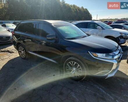 Чорний Міцубісі Аутлендер, об'ємом двигуна 2.36 л та пробігом 99 тис. км за 2100 $, фото 3 на Automoto.ua