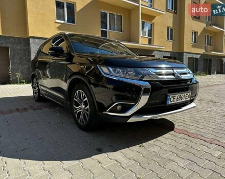 Чорний Міцубісі Аутлендер, об'ємом двигуна 2.36 л та пробігом 225 тис. км за 13699 $, фото 2 на Automoto.ua