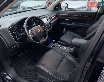 Черный Мицубиси Аутлендер, объемом двигателя 3 л и пробегом 146 тыс. км за 15990 $, фото 9 на Automoto.ua