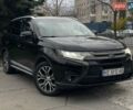 Черный Мицубиси Аутлендер, объемом двигателя 2.36 л и пробегом 167 тыс. км за 13500 $, фото 1 на Automoto.ua