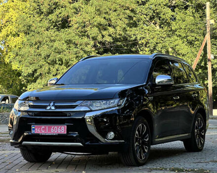 Чорний Міцубісі Аутлендер, об'ємом двигуна 2 л та пробігом 233 тис. км за 18000 $, фото 27 на Automoto.ua