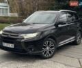 Черный Мицубиси Аутлендер, объемом двигателя 2.36 л и пробегом 167 тыс. км за 13500 $, фото 2 на Automoto.ua