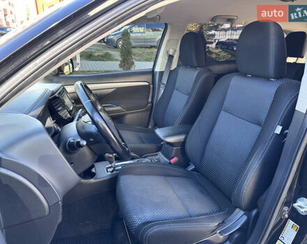 Черный Мицубиси Аутлендер, объемом двигателя 2.36 л и пробегом 150 тыс. км за 14900 $, фото 22 на Automoto.ua