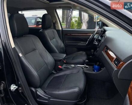 Чорний Міцубісі Аутлендер, об'ємом двигуна 3 л та пробігом 146 тис. км за 16690 $, фото 17 на Automoto.ua