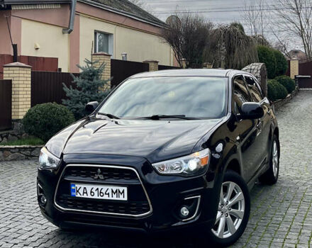 Чорний Міцубісі Аутлендер, об'ємом двигуна 2 л та пробігом 170 тис. км за 10999 $, фото 1 на Automoto.ua