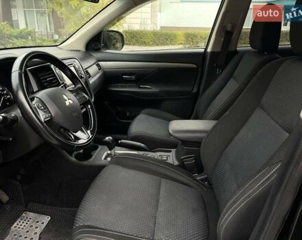 Черный Мицубиси Аутлендер, объемом двигателя 2.36 л и пробегом 167 тыс. км за 13500 $, фото 10 на Automoto.ua