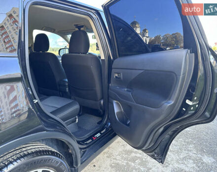 Черный Мицубиси Аутлендер, объемом двигателя 2.36 л и пробегом 150 тыс. км за 14900 $, фото 38 на Automoto.ua