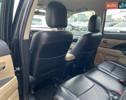 Черный Мицубиси Аутлендер, объемом двигателя 2.36 л и пробегом 143 тыс. км за 12900 $, фото 20 на Automoto.ua