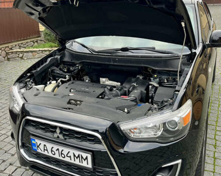 Чорний Міцубісі Аутлендер, об'ємом двигуна 2 л та пробігом 170 тис. км за 10999 $, фото 35 на Automoto.ua
