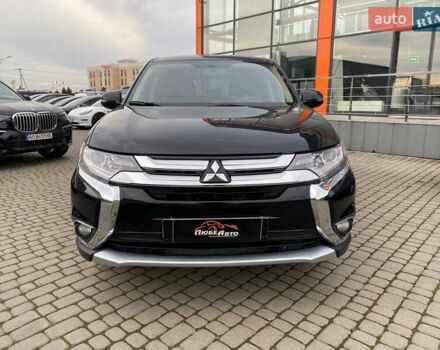 Черный Мицубиси Аутлендер, объемом двигателя 2.36 л и пробегом 143 тыс. км за 12900 $, фото 1 на Automoto.ua