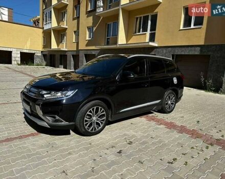 Чорний Міцубісі Аутлендер, об'ємом двигуна 2.36 л та пробігом 225 тис. км за 13699 $, фото 3 на Automoto.ua