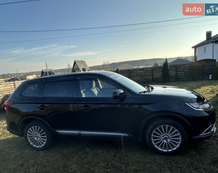 Черный Мицубиси Аутлендер, объемом двигателя 2.36 л и пробегом 144 тыс. км за 15300 $, фото 2 на Automoto.ua