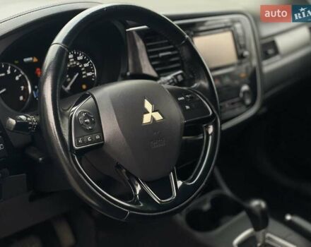 Черный Мицубиси Аутлендер, объемом двигателя 2.36 л и пробегом 167 тыс. км за 13500 $, фото 13 на Automoto.ua