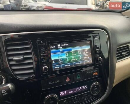 Черный Мицубиси Аутлендер, объемом двигателя 2.36 л и пробегом 143 тыс. км за 12900 $, фото 14 на Automoto.ua