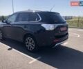 Черный Мицубиси Аутлендер, объемом двигателя 2 л и пробегом 170 тыс. км за 16800 $, фото 6 на Automoto.ua