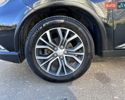 Черный Мицубиси Аутлендер, объемом двигателя 2.36 л и пробегом 150 тыс. км за 14900 $, фото 15 на Automoto.ua