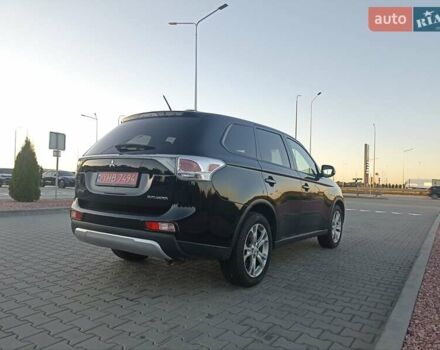 Черный Мицубиси Аутлендер, объемом двигателя 0 л и пробегом 203 тыс. км за 12600 $, фото 1 на Automoto.ua