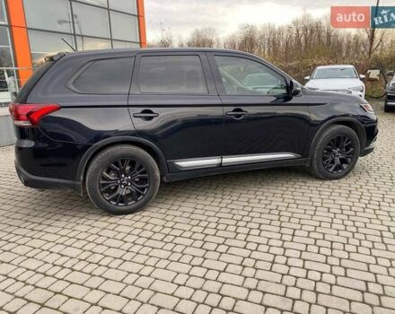 Черный Мицубиси Аутлендер, объемом двигателя 2.36 л и пробегом 143 тыс. км за 12900 $, фото 7 на Automoto.ua