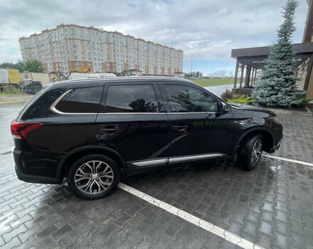 Черный Мицубиси Аутлендер, объемом двигателя 3 л и пробегом 257 тыс. км за 13699 $, фото 2 на Automoto.ua