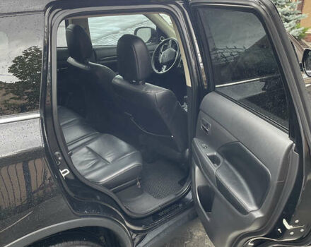 Черный Мицубиси Аутлендер, объемом двигателя 3 л и пробегом 257 тыс. км за 13699 $, фото 13 на Automoto.ua