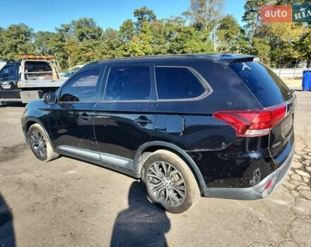 Чорний Міцубісі Аутлендер, об'ємом двигуна 2.36 л та пробігом 99 тис. км за 2100 $, фото 1 на Automoto.ua