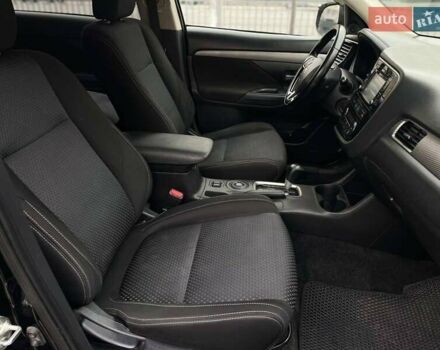 Черный Мицубиси Аутлендер, объемом двигателя 2.36 л и пробегом 167 тыс. км за 13500 $, фото 18 на Automoto.ua