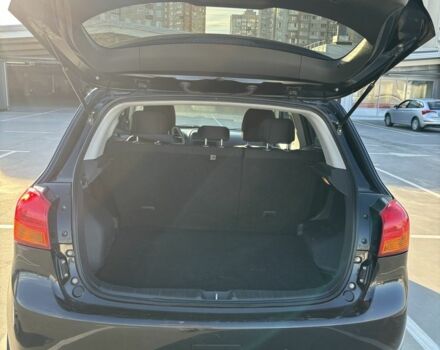 Черный Мицубиси Аутлендер, объемом двигателя 2 л и пробегом 105 тыс. км за 9999 $, фото 4 на Automoto.ua