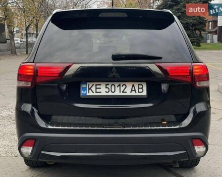 Черный Мицубиси Аутлендер, объемом двигателя 2.36 л и пробегом 167 тыс. км за 13500 $, фото 4 на Automoto.ua