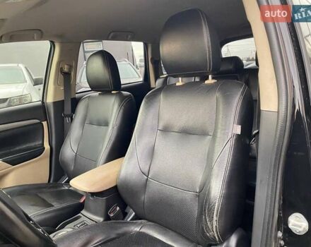 Черный Мицубиси Аутлендер, объемом двигателя 2.36 л и пробегом 143 тыс. км за 12900 $, фото 18 на Automoto.ua