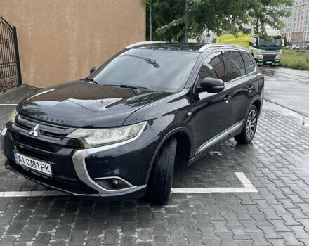 Черный Мицубиси Аутлендер, объемом двигателя 3 л и пробегом 257 тыс. км за 13699 $, фото 1 на Automoto.ua