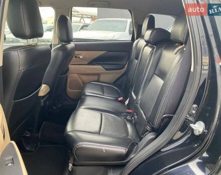 Черный Мицубиси Аутлендер, объемом двигателя 2.36 л и пробегом 143 тыс. км за 12900 $, фото 19 на Automoto.ua