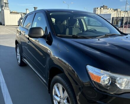 Черный Мицубиси Аутлендер, объемом двигателя 2 л и пробегом 105 тыс. км за 9999 $, фото 2 на Automoto.ua