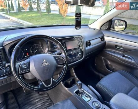 Черный Мицубиси Аутлендер, объемом двигателя 2.36 л и пробегом 150 тыс. км за 14900 $, фото 23 на Automoto.ua