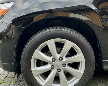 Чорний Міцубісі Аутлендер, об'ємом двигуна 2 л та пробігом 170 тис. км за 10999 $, фото 34 на Automoto.ua