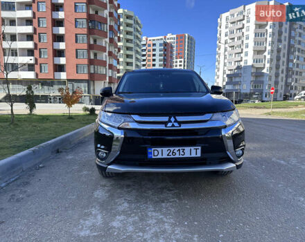 Черный Мицубиси Аутлендер, объемом двигателя 2.36 л и пробегом 150 тыс. км за 14900 $, фото 3 на Automoto.ua