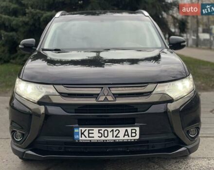 Черный Мицубиси Аутлендер, объемом двигателя 2.36 л и пробегом 167 тыс. км за 13500 $, фото 1 на Automoto.ua