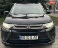 Черный Мицубиси Аутлендер, объемом двигателя 2.36 л и пробегом 167 тыс. км за 13500 $, фото 1 на Automoto.ua