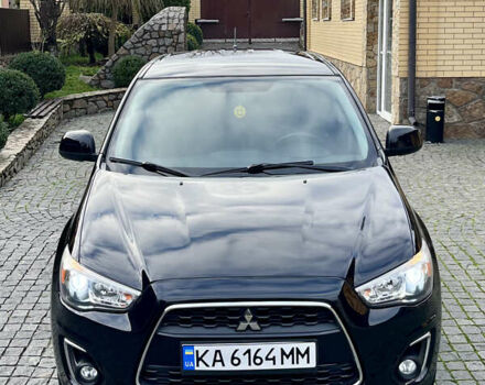 Чорний Міцубісі Аутлендер, об'ємом двигуна 2 л та пробігом 170 тис. км за 10999 $, фото 6 на Automoto.ua