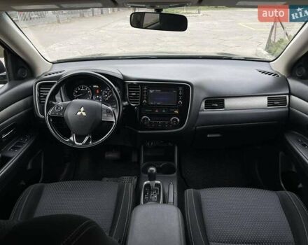 Черный Мицубиси Аутлендер, объемом двигателя 2.36 л и пробегом 167 тыс. км за 13500 $, фото 15 на Automoto.ua
