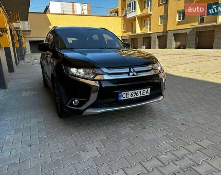 Чорний Міцубісі Аутлендер, об'ємом двигуна 2.36 л та пробігом 225 тис. км за 13699 $, фото 1 на Automoto.ua