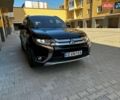 Чорний Міцубісі Аутлендер, об'ємом двигуна 2.36 л та пробігом 225 тис. км за 13699 $, фото 1 на Automoto.ua